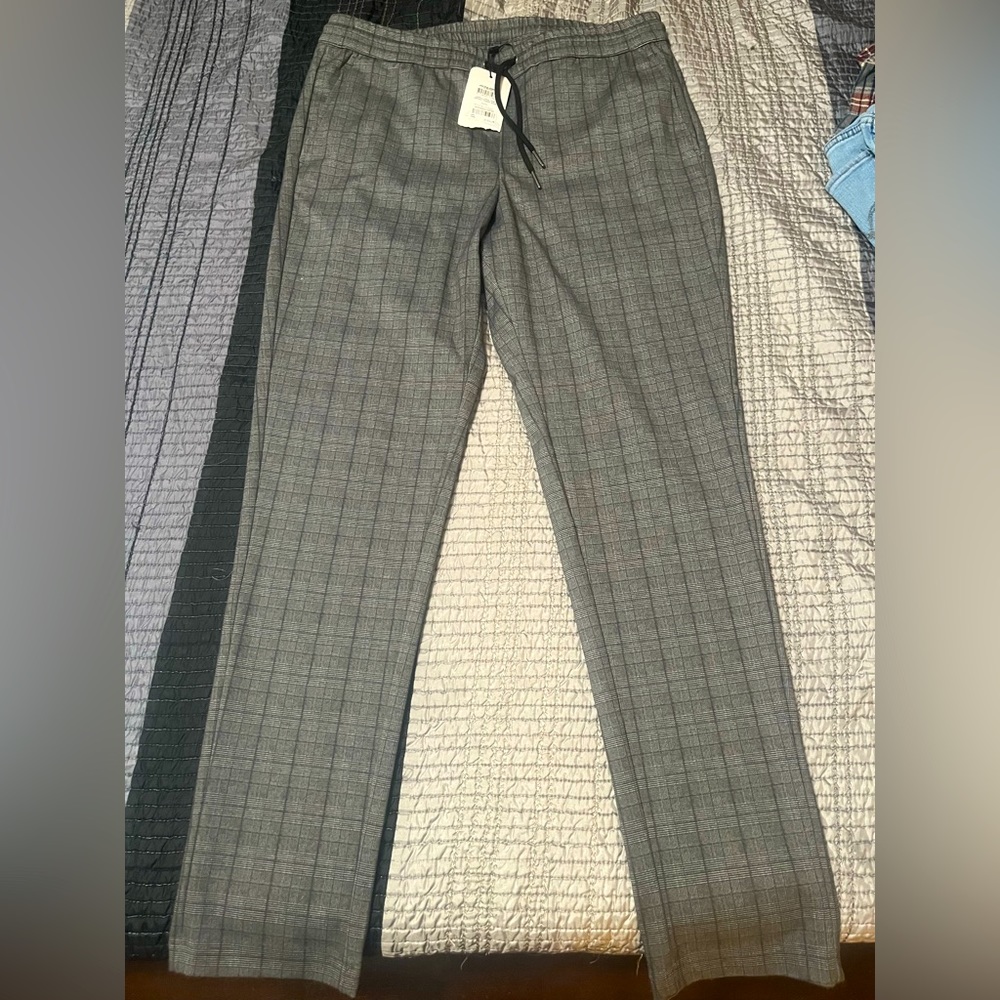 Jack & Jones, size M, new with tags. Grey, white and black striped pants.